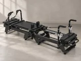 Black Carriage One family reformer in a clean neutral studio