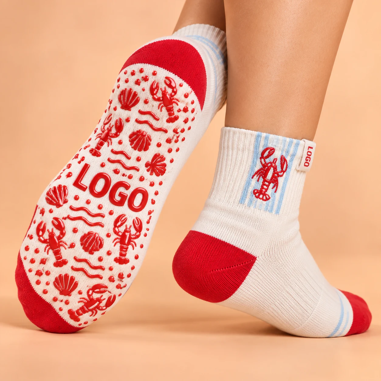 Lobster grip socks showing studio artwork and a visible LOGO sole treatment