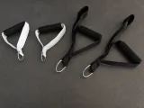 Four Carriage One handle and strap assemblies with foam grips and metal rings