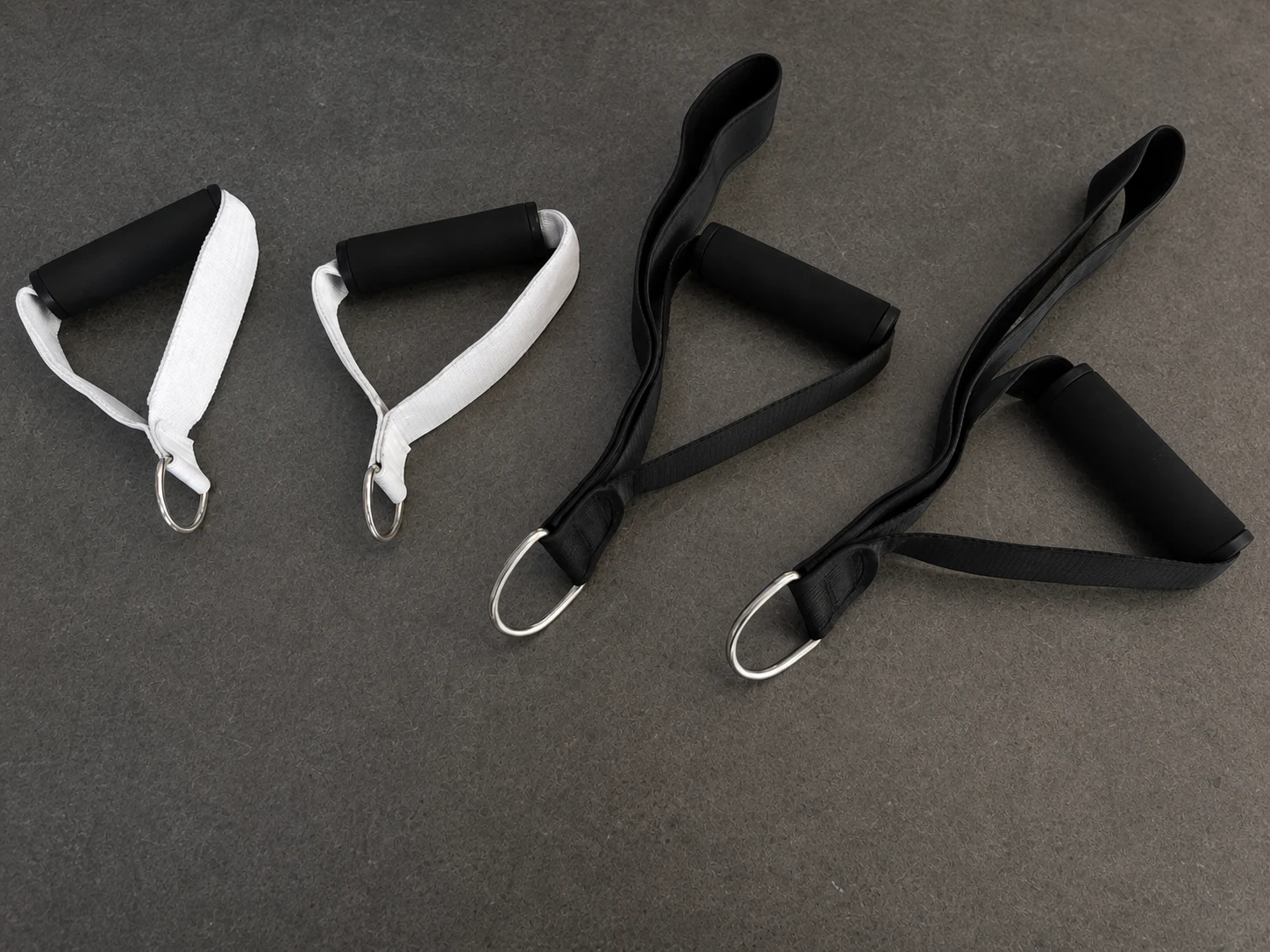 Carriage One handle and strap options in black and white