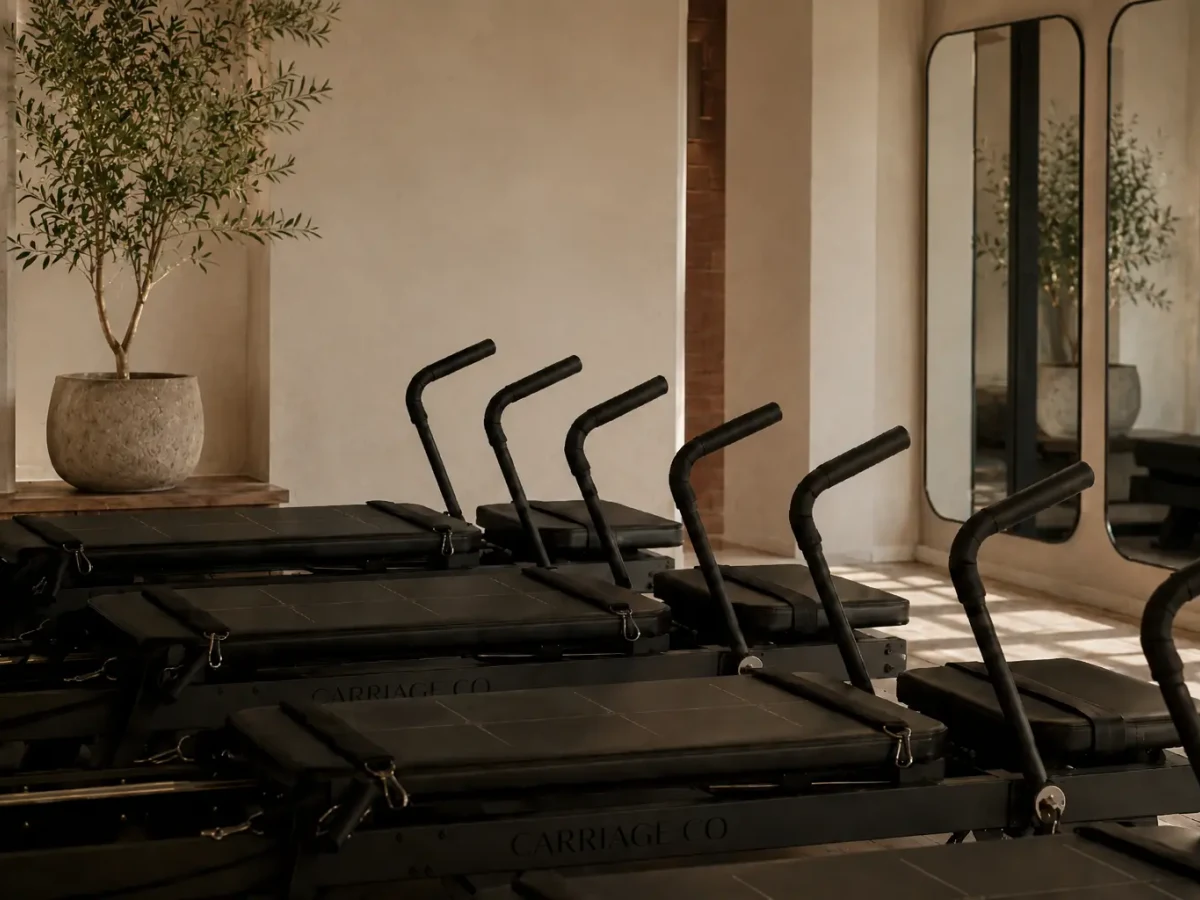 Exact Carriage One machines installed in a warm studio room